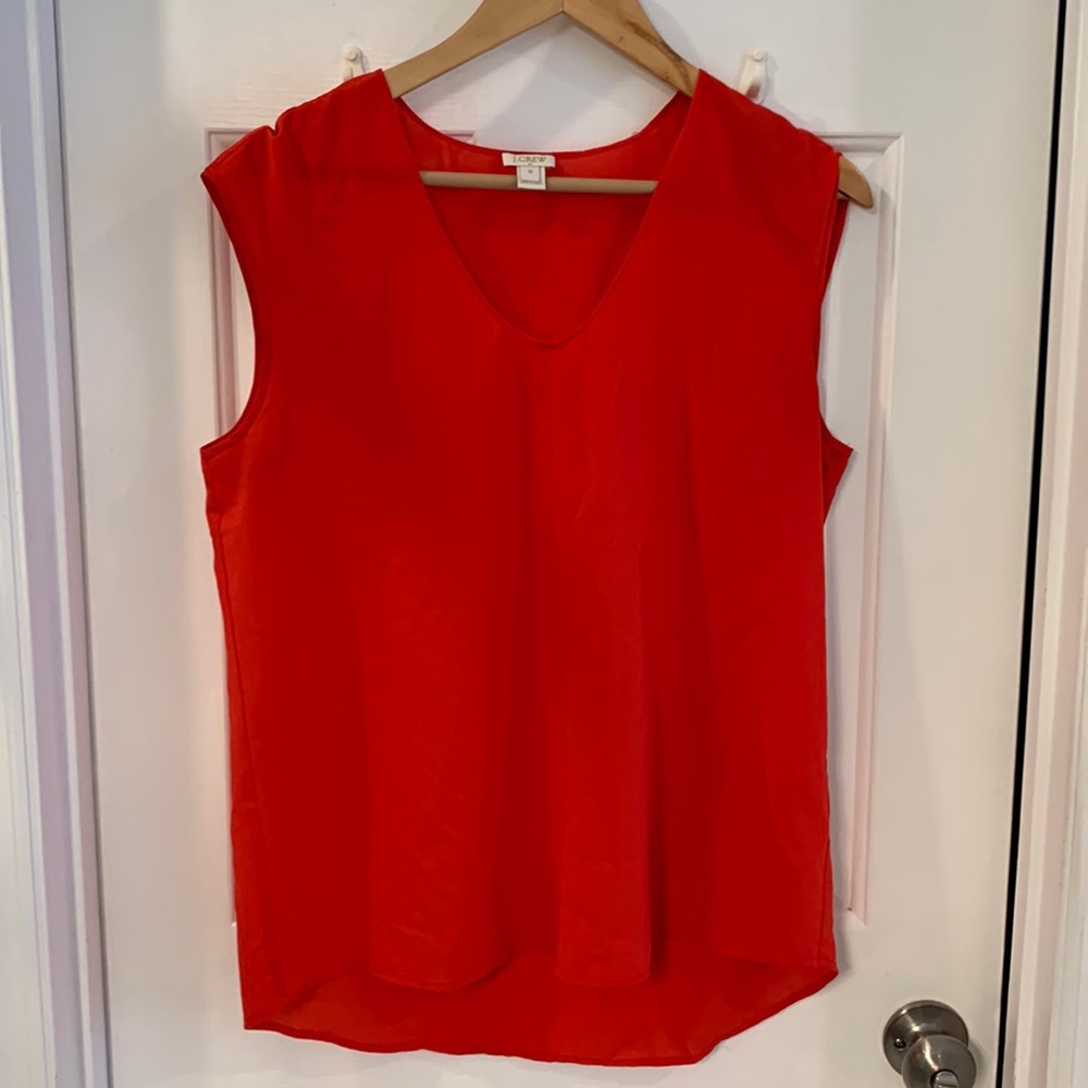 Red sleeveless J Crew shirt